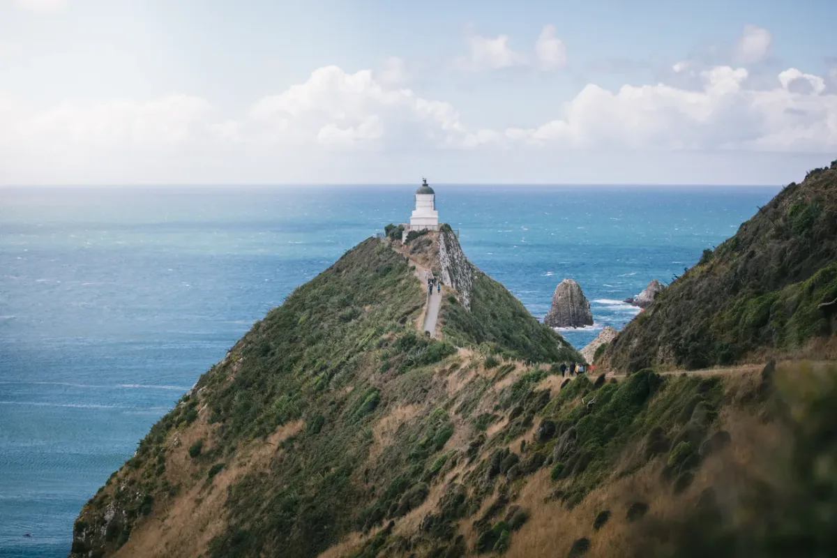 Nugget Point lighthouse above rocky islets in the Catlins